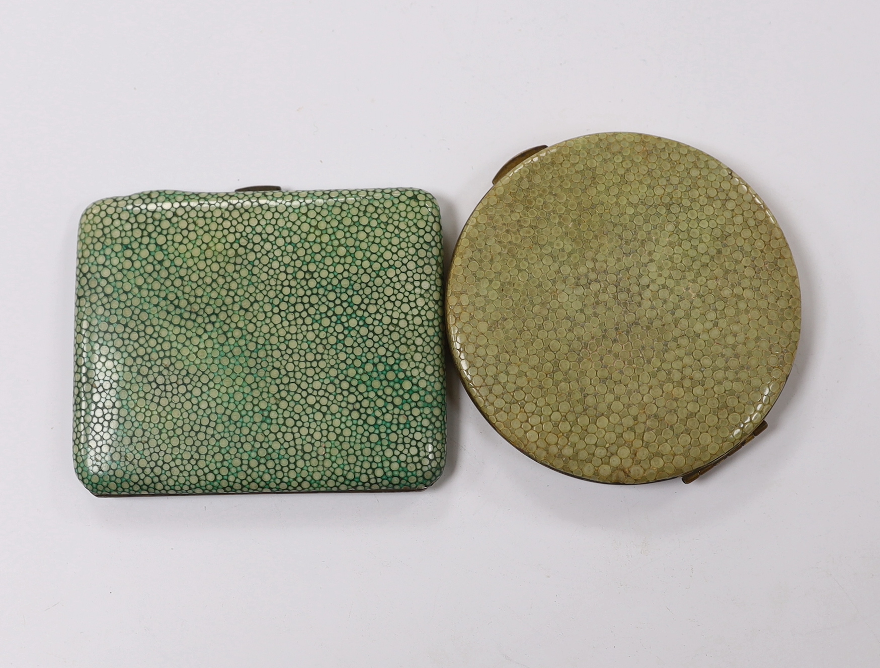 A George V shagreen mounted silver gilt cigarette case, by Samson Mordan & Co, London 1929, 86mm, together with a shagreen mounted gilt metal compact.
